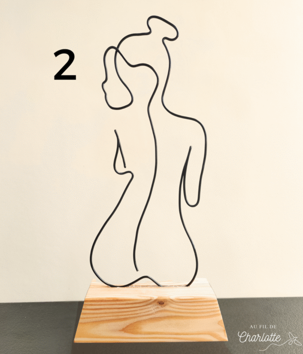 Silhouette de femme minimaliste en fil de fer
