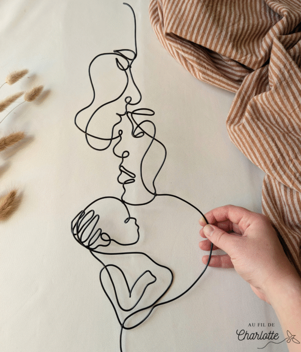 Couple avec bébé en fil de fer décoration murale