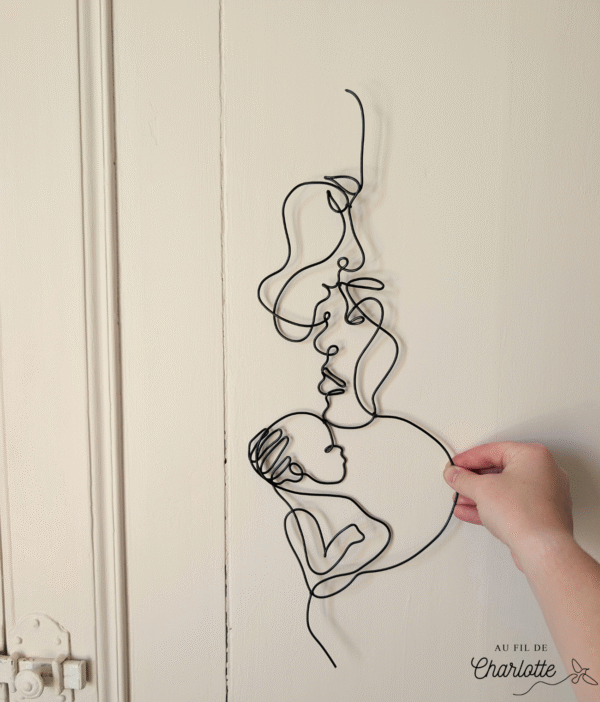 Couple avec bébé en fil de fer décoration murale