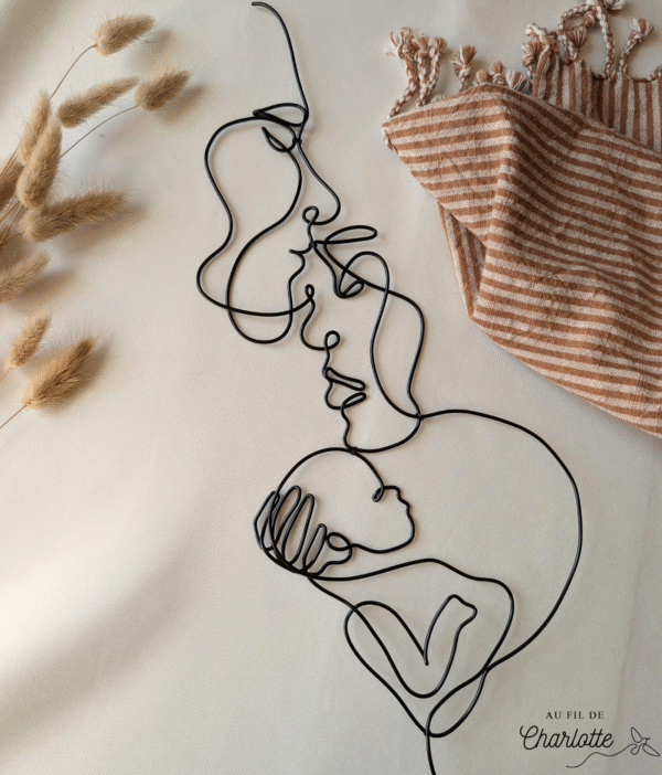 Couple avec bébé en fil de fer décoration murale