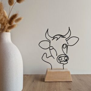 Tête de vache sur socle en bois